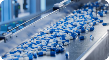Pharmaceutical industry with production line and pills